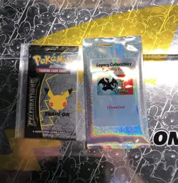 1 Pokemon TCG 25th Anniversary Celebrations Booster & 1 Legacy Collectibles Pack - Image 1