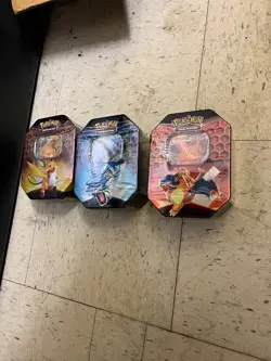 Set of 3 Pokemon Hidden Fates Tins - Charizard, Gyarados, and Raichu - Sealed - Image 1