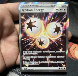 Ignition Energy 124/094 Mega Evolution Phantasmal Flames Full Art Holo Pokemon - Image 1