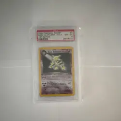 Pokemon Team Rocket Dark Alakazam 1st Edition Holo PSA 8 1/82 English - Image 1