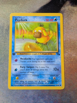 Pokemon Psyduck Fossil 1st Edition - LP - Image 1