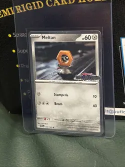 [Stamped] Meltan 102/142 Stellar Crown Stamped Cosmo Foil - Pokemon TCG Promo - Image 1