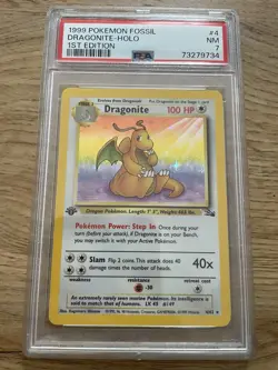 1999 POKEMON 1ST EDITION FOSSIL DRAGONITE HOLO PSA 7 4/62 - Image 1