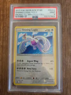 The Pokemon Company 2017 Shining Lugia SM Black Star Promo SM82 Holo PSA 9 - Image 1