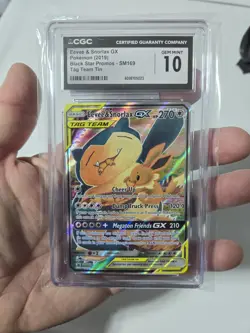 CGC 10 Eevee & Snorlax GX SM169 2019 Black Star Promo Tag Team Tin Pokemon Card - Image 1