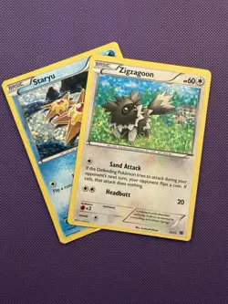 2015 Pokemon Zigzagoon 11/12 and Staryu 4/12- McDonald's Promo Confetti Holo LP - Image 1