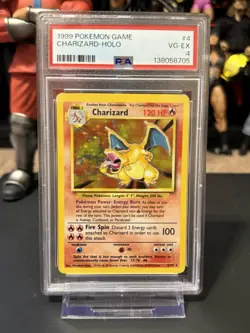 1999 POKEMON BASE SET UNLIMITED #4 CHARIZARD-HOLO PSA 4 - Image 1