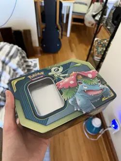 Pokemon TCG tin Feat Venosaur And Celebi With True Fit Sleeves - Image 1