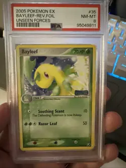 2005 POKEMON EX UNSEEN FORCES #35 BAYLEEF-REVERSE FOIL PSA 8 - Image 1