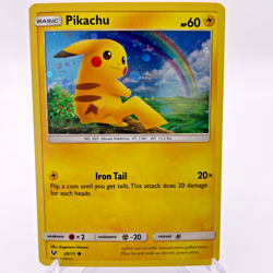 Pokemon TCG Pikachu 28/73 Cosmos Holo Sun & Moon Base Set - Image 1