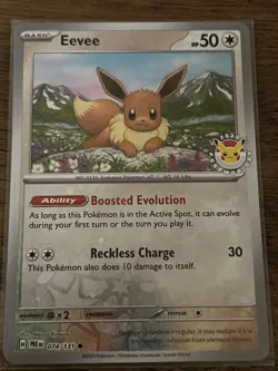 Eevee (74/131) [Reverse Holo] (NM) - Prismatic Evolutions Pokemon Day 2025 Promo - Image 1