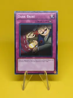 Yugioh - Dark Bribe (SDGU-EN039) - Common 1st Edition - Image 1
