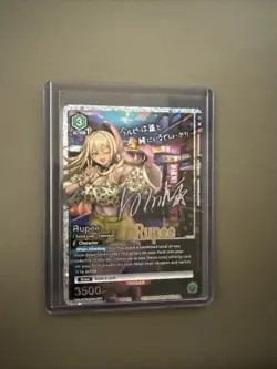 Rupee (077) SR** - UE14BT Union Arena Goddess Of Victory: Nikke - Image 1