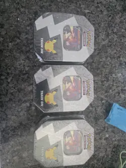 Lot of 3 Pokemon TCG Celebrations 25th Anniversary Tin Lance's Charizard Sealed - Image 1