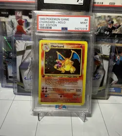 Charizard 1st Edition Holo 1999 Pokemon PSA 9 & 7.5 - Image 1
