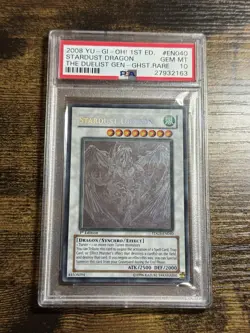 2008 YU-GI-OH! TDGS-THE DUELIST GENESIS 1ST ED-GHOST RARE STARDUST DRAGON PSA 10 - Image 1