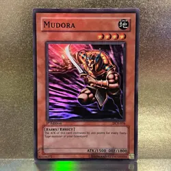 YuGiOh • Mudora • DCR-076 • 1st Edition Holo Super Rare • LP - Image 1