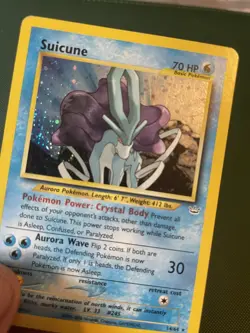 Pokemon 2001 Suicune 14/64 Neo Revelation Holo heavy play - Image 3