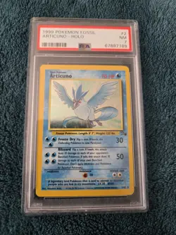 1999 POKEMON FOSSIL #2 ARTICUNO-HOLO PSA 7 - Image 1
