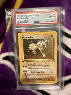 1999 POKEMON FOSSIL 1ST ED #7 HITMONLEE-HOLO PSA 8 - Image 1