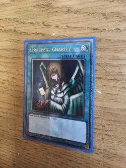 YUGIOH GRACEFUL CHARITY QUARTER CENTURY SECRET RARE 1ST NM RA03-EN116 - Image 1