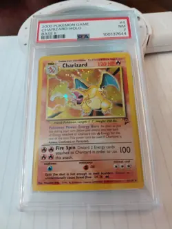 Pokemon TCG Charizard Holo Rare Card Base Set, PSA 7 - Image 1