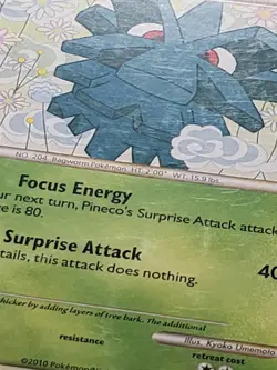 Pineco 63/90 DMG - B1G1F Undaunted Pokemon Card - Kyoko Umemoto Art - Image 2