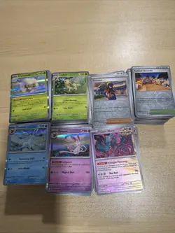 Pokemon Prismatic Evolutions TCG Bulk Lot - 1,000+ Cards Holo/REV/UNC/commons - Image 1