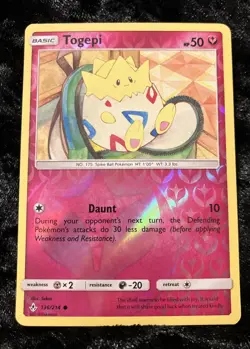 Togepi 136/214 NM Reverse Holo Cute Egg Unbroken Bonds Pink Fairy Pokemon Card - Image 1