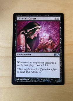 Liliana's Caress (LP) Magic 2011 (M11) - Regular Finish MTG - Image 1