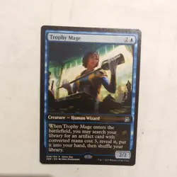 Trophy Mage - Game Day Promo (Showcase) - Aether Revolt - MTG - Image 1