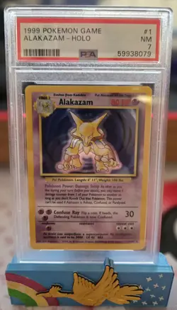 1999 Pokemon Game Base #1 Alakazam Holo - PSA 7 - Image 1