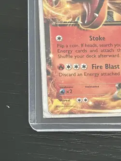 Charizard EX 11/106) holographic card from the 2014 Pokemon Trading Card Game XY - Image 2