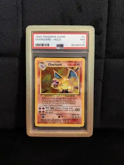PSA 7 Charizard 4/102 Base Set Rare Holo Pokemon Card 1999 WOTC - Near Mint - Image 1