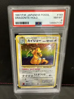 1997 Pokemon TCG Dragonite Holo Japanese Fossil #149 PSA 8 - Image 1