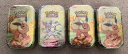 Pokemon TCG: Prismatic Evolutions Mini Tins x4 – Sealed - Image 1