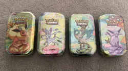 Pokemon TCG: Prismatic Evolutions Mini Tins x 4 – Sealed - Image 1