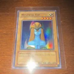 Konami Mystical Elf LOB-062 Blue Eyes Unlimited Super Rare Holo Card - Image 1