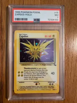1999 POKEMON FOSSIL ZAPDOS HOLO 15/62 PSA 7 - Image 1
