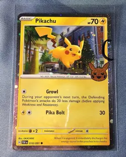 Pokemon TCG Pikachu Cosmo Holo with Rare Swirl 018/091 PAF 2024 Trick or Trade - Image 1