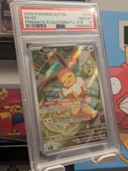PSA 10 EEVEE SVP 173 POKEMON CENTER ETB PROMO PRISMATIC EVOLUTIONS 2025 ART RARE - Image 1