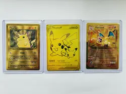 Pokemon Gold Metal Cards Charizard and Pikachu UPC 25th Anniversary Celebrations - Image 1