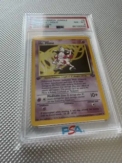 1999 Pokemon TCG Jungle Mr. Mime Holo 1st Edition PSA 8 6/64 Card Stock - Image 1