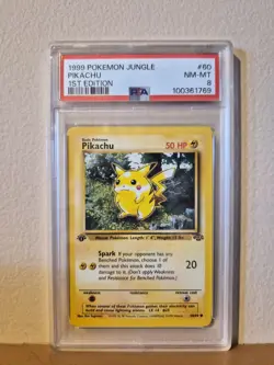 1999 POKEMON JUNGLE #60 PIKACHU 1ST EDITION PSA 8 - Image 1