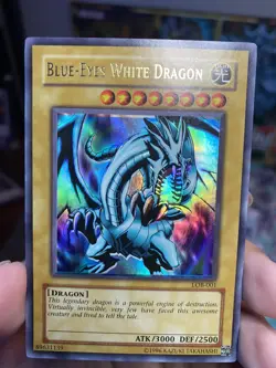 Yu-Gi-Oh! Blue-Eyes White Dragon LOB-001 Unlimited NM Foil Shift Misprint! - Image 1