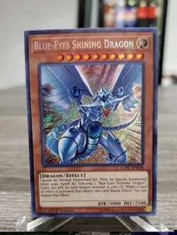 YUGIOH! Blue-Eyes Shining Dragon LCKC-EN008 Secret Rare 1st Edition LP - Image 1