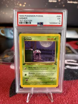 Grimer 1st Ed. 1999 Pokemon Fossil PSA 5 - Image 1
