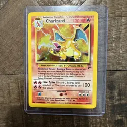 Base Set 2 Charizard Holo Unlimited Rare Pokemon Card 4/130 LP BIG SWIRL - Image 1