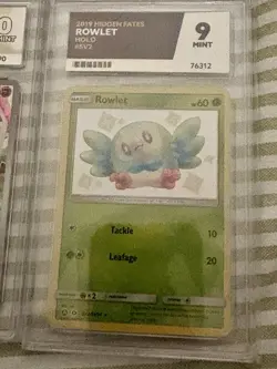 Pokemon TCG Rowlet Graded Slab - Image 1