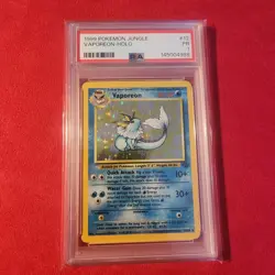 1999 POKEMON JUNGLE #12 VAPOREON-HOLO PSA 1 Poor - Image 1